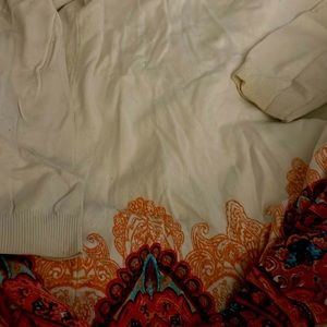 Beautiful colors, 1/2 Sleeve , Soft feeling Sweater! Worn but not too often!